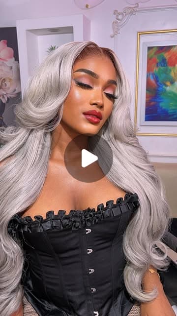 Glam portrait with silver curly hair and defined makeup