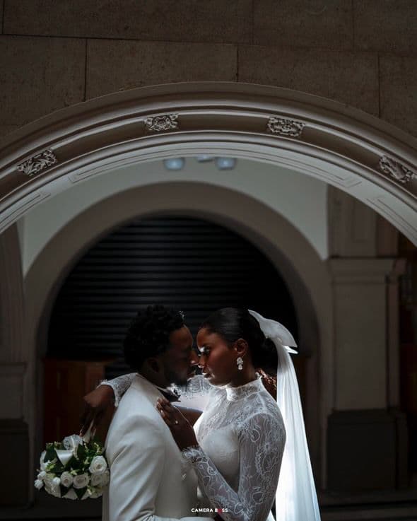 Bridal portrait holding a bouquet with soft glam makeup
