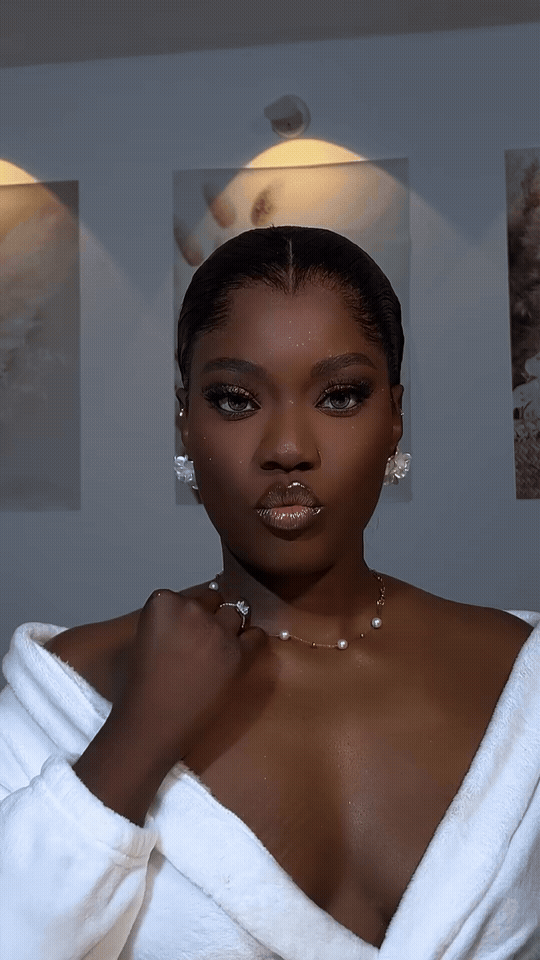 Looping video of bride during makeup prep